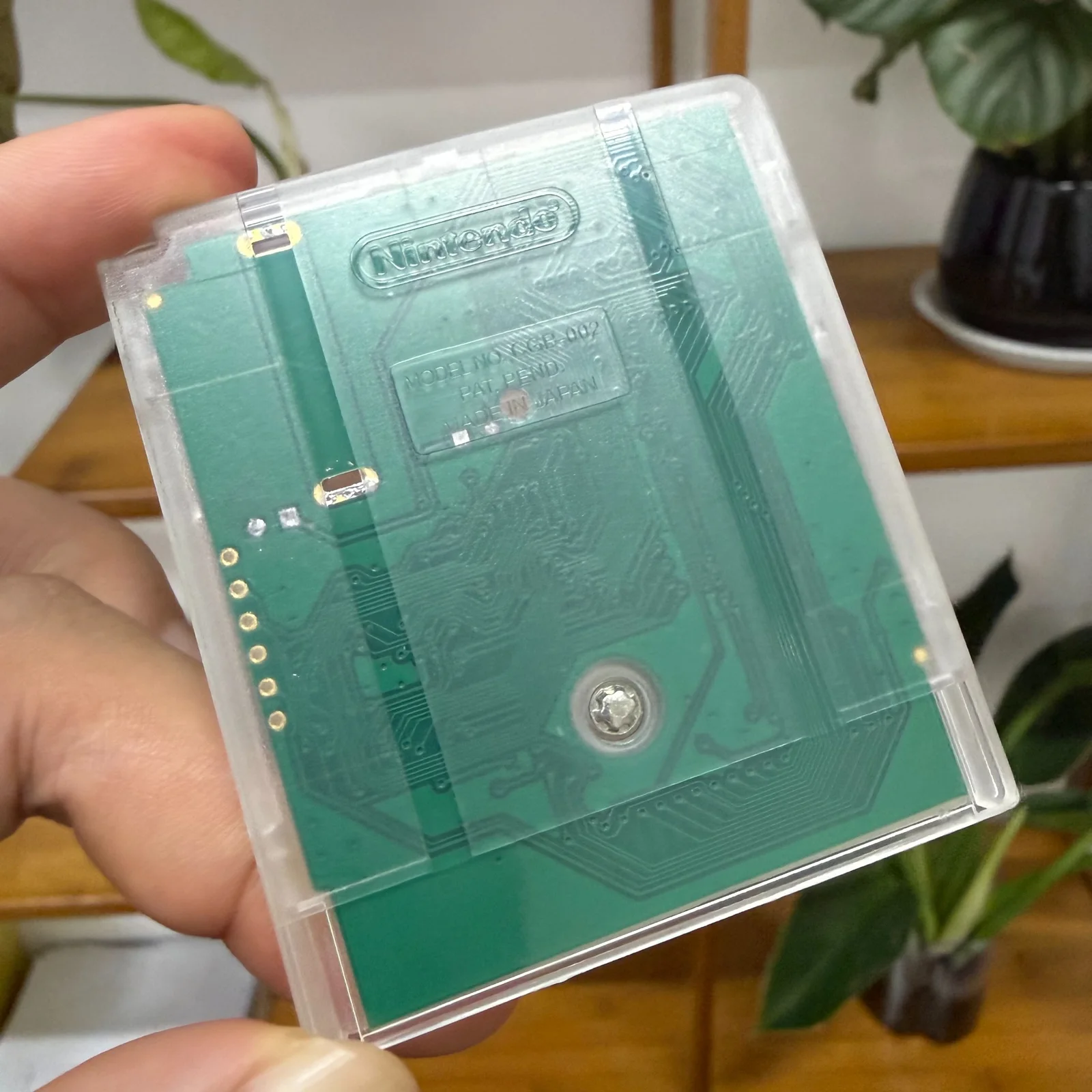 Original supplied transparent cartridge sample used to discuss programming compatibility; not an actual programming test